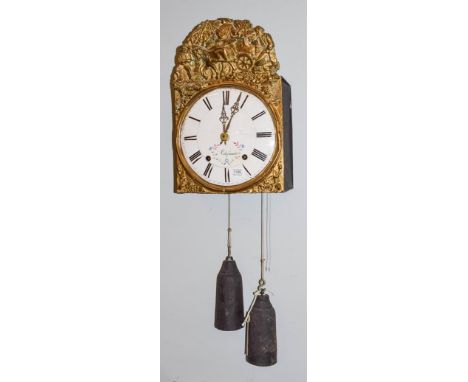 A 19th century French brass wall clock with enamel dial, striking on a bell and with pull repeater.  Sold with weights and pe