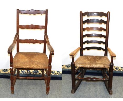 A 19th century elm ladder back rocking chair and an early 20th century oak rush seated open armchair (2)