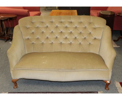 A small button back sofa, 150cm by 70cm by 86cm