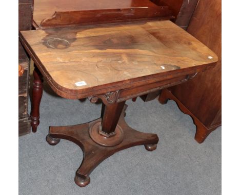 A Regency rosewood fold-over card table, with hexagonal pedestal and bun feet, 91.5cm by 45cm by 74cm high 