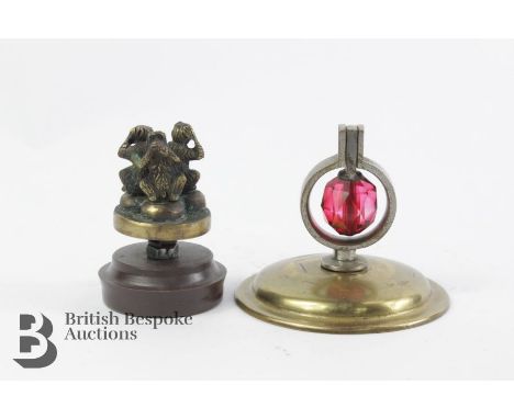 Edwardian light car mascot, three wise monkeys, approx 4 cms together with a brass gimble nickle-plated mascot, approx 6 cms 