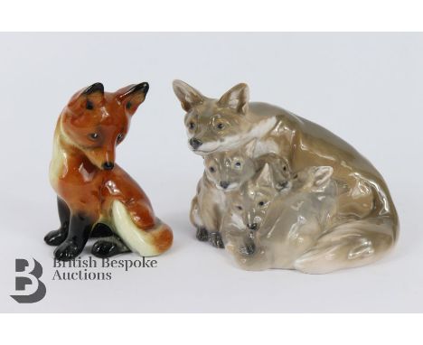 Royal Copenhagen porcelain group vixen and cubs approx 11 cms h together with a ceramic fox cub unmarked.&nbsp;