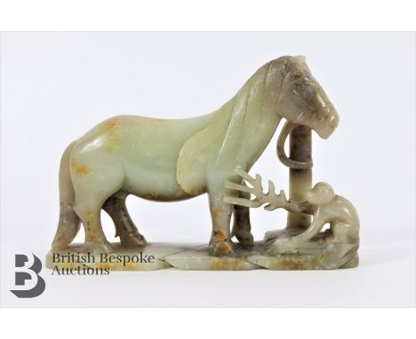 Chinese 19th century mutton jade group, standing horse tied to a hitching post, attended by a small monkey, approx 14 x 9.3 c