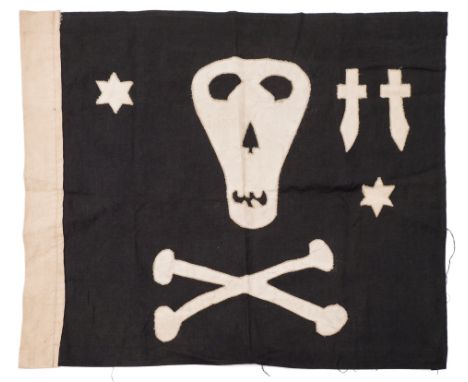 A commemorative 'Jolly Roger' from HMS Submarine 'Taku' (N38) circa 1945:, black cotton filled with stitched calico skull and