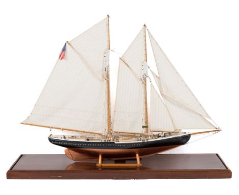 A 20th century scale model of an American schooner style yacht 'Gloucester':, fully rigged over  simulated plank deck with fi