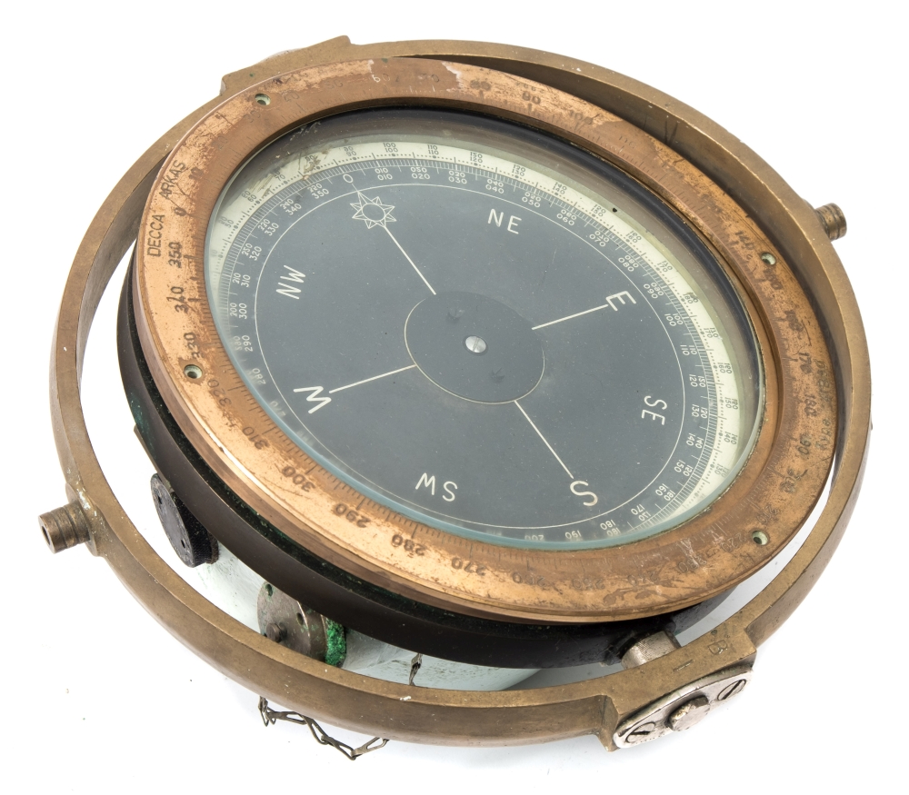 An 8 inch brass cased gyro compass, in gimbal mount , together with an