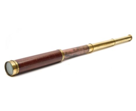 A mahogany and brass three draw telescope by Dollond, London:, 73cm extended.