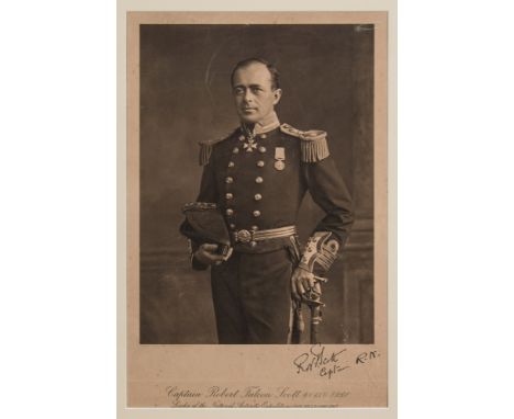 A  monochrome lithograph portrait of Captain Robert Falcon Scott in Naval uniform:,  with facsimile signature lower right, pu