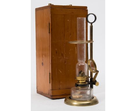 An early 20th century lacquered brass microscope lantern:, unsigned, the glass shade and reservoir on an adjustable stand wit