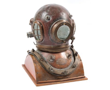 A 12-bolt diving helmet by Siebe Gorman & Co Ltd, London:, matching numbers '17450', oval side windows with guards, circular 