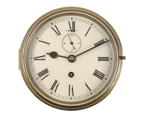 A brass cased circular bulkhead clock:, unsigned, white enamel dial with Roman numerals and subsidiary seconds dial, 21cm dia