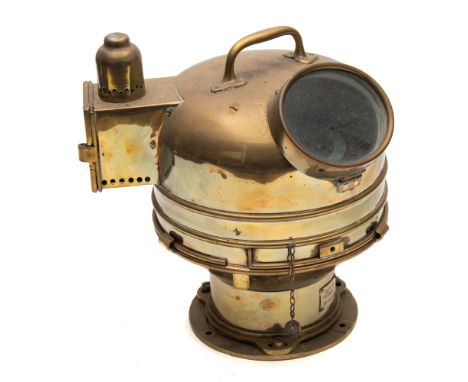 An Admiralty pattern 919 compass:, No 44/E/63, with 4 inch liquid filled compass in a gimbaled mount in a brass case with lam