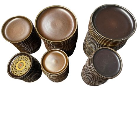 A large collection of Denby plates.  30 large dark brown, 26 large light brown, 22 medium light brown, 30 small dark brown, 2