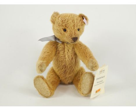 A Steiff model of an Appolnia teddy bear, nr 00880, circa 2004, with certificate.