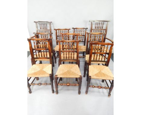 A set of ten Georgian oak rush seated country dining chairs, with bobbin turned backed, raised on turned legs united by stret