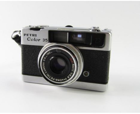 A Petri Color 35 camera, with a 1:2.8 F=40mm lens, cased.