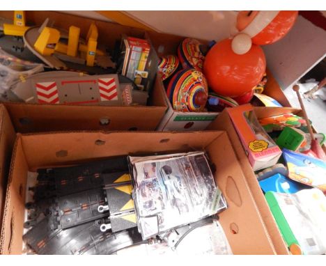 A Corgi Multi-Storey Car Park and Filing Station, die cast vehicles, spinning tops, Scalextric track and sundry toys, (qty).