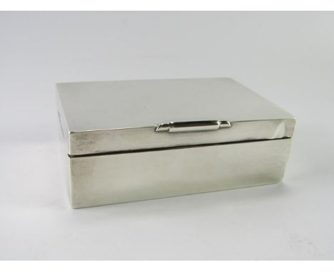 A George VI silver twin division cigarette box, with engine turned decoration. Birmingham 1949, 13.60oz all in.