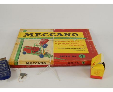 A Meccano Outfit No 4, Magic Clockwork Motor and Emebo electric motor, boxed, (3).