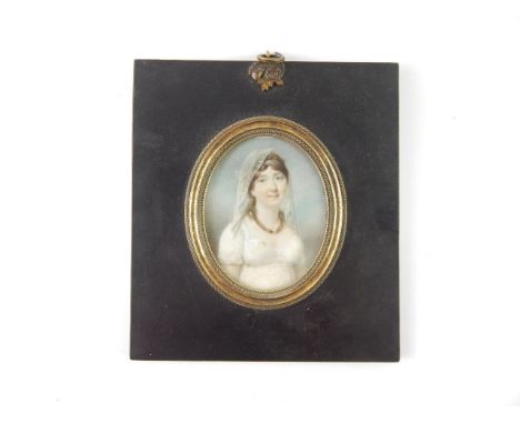 English School (early 19thC). Half length portrait of a lady in a white dress and veil, miniature watercolour, 8cm x 6.5cm.