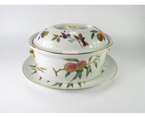 A Royal Worcester oven to tableware casserole dish and cover, decorated in the Evesham pattern, and an oval meat platter, (2)