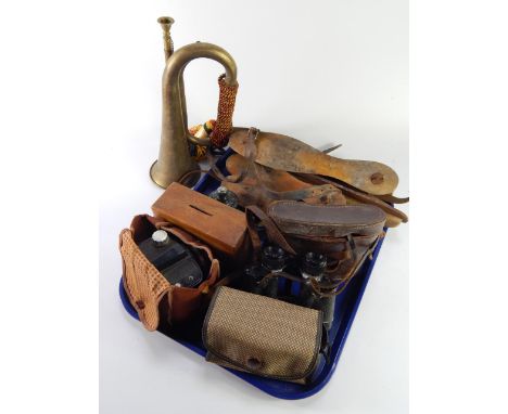 An Agfa Clock camera, Kodak Brownie 127, pair of Deauville 8x30 binoculars, serpentine inkwell, pairs of ice skates and a bra