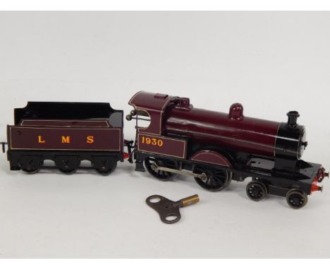 A Hornby O gauge tank engine, LMS 1930, red livery.
