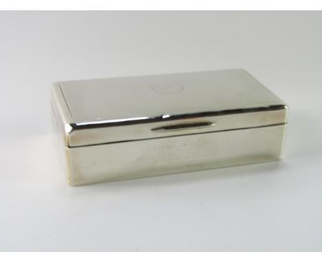 A George VI silver twin division cigarette box, with engine turned decoration, reserve monogram and presentation engraved, Lo