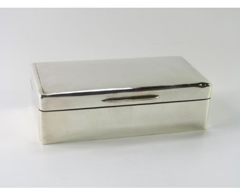A George VI silver twin division cigarette box, with engine turned decoration, London 1945, 16.78oz all in.