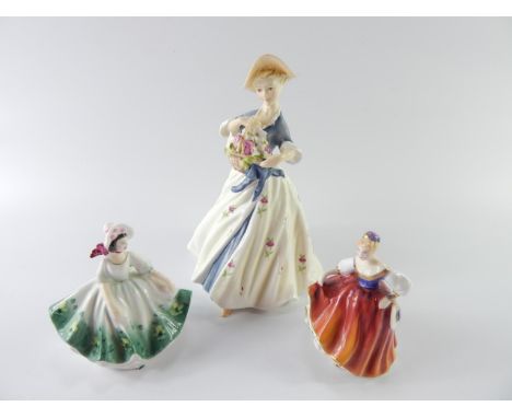 A Royal Worcester figure of Summer Day, 19cm high, and two Royal Doulton figures of Fair Lady HN3336 and Sunday Best HN3218, 