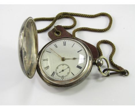 A Victorian silver hunting cased gentleman's pocket watch, key wind, enamel dial bearing Roman numerals, subsidiary seconds d