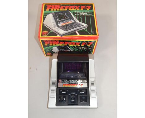 A Grandstand Firefox F-7, space action, 3D effect, twin speaker sound, boxed.