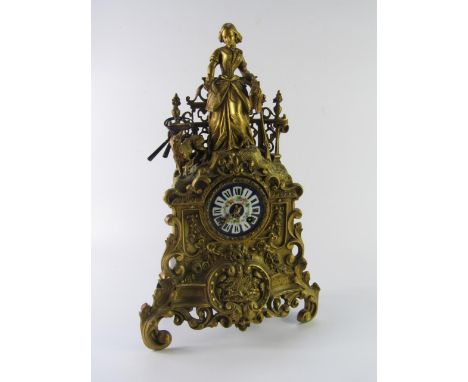 A French late 19thc gilt metal mantel clock, porcelain dial bearing Roman numerals, eight day movement by Japy Freres et Cie,
