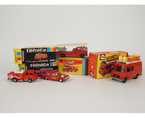 A Siku die cast Wasserrrettungsfahrzeug V339, Impy fire engine 30, Tomica Chemical Fire Truck 22, and a Cedric Fire Chief Car