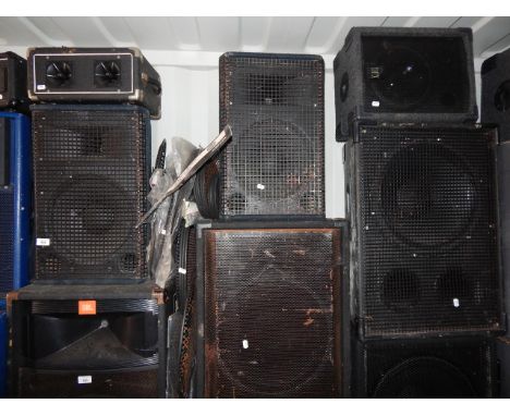 A selection of speaker cabinets, comprising PA tops, tweeters, speaker grills, etc, and a rack mounted cross over unit with f
