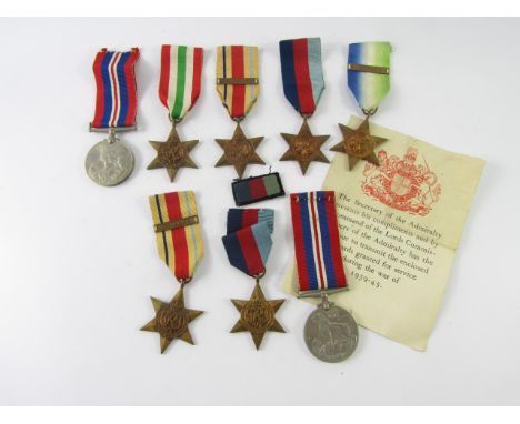 WWII War medals, comprising two 1939-45 Stars, Atlantic Star with France and Germany clasp, two Africa Stars with 1st Army an
