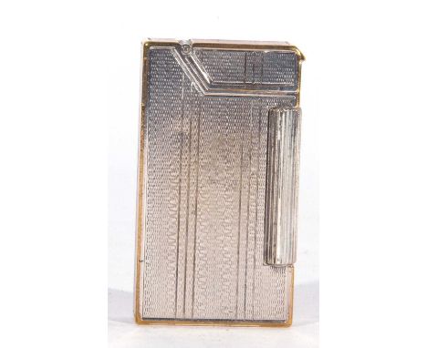 Vintage Dunhill petrol lighter in Art Deco taste with silvered and gilt metal case (no hallmarks), patent no 440072, having b