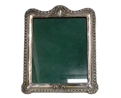 Edward VII large silver photograph frame of rectangular form with decorative embossed fluted design, easel back, Chester 1903