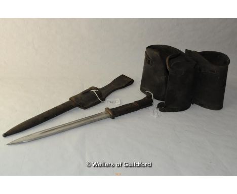 An Erfurt bayonet with scabbard and leather belt attachment, 40.5cm overall; a pair of leather spats.