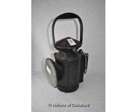 A black tin lamp, 32cm.