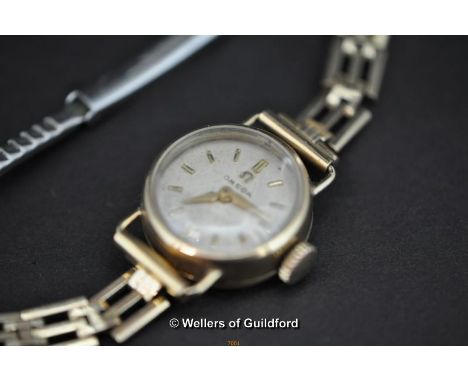 Omega lady's wristwatch, the circular dial with baton hour markers, 17 jewel manual wind movement, interior of case stamped 3