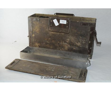 A metal bound wooden ammunition box with carrying handles, 24 x 40.5cm.