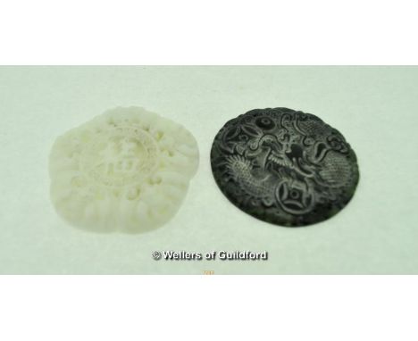 Pair of Chinese jade pendants, carved with scenes of bats and a dragon