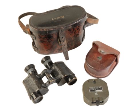 A PAIR OF CARL ZEISS JENA BINOCULARS the backplate stamped D.F 8X 208356, in a leather carrying case, the top of the lid stam