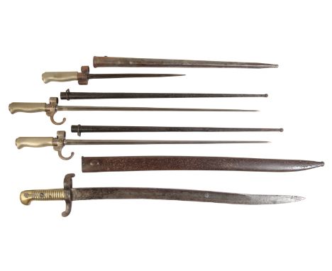 THREE BRITISH SPIKE BAYONETS in their original metal scabbards; and another British bayonet, in the original metal scabbard (
