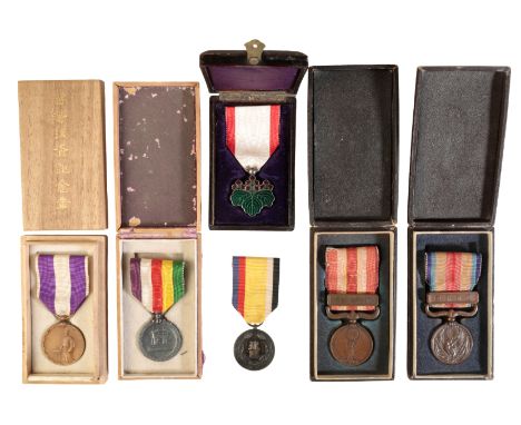 JAPAN. SIX ORDERS AND MEDALS Japan. Order of the Rising Sun (??? Kyokujitsu sho), VII class, in original fitted embossed rio-