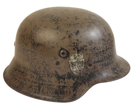 A WWII GERMAN STYLE HELMET with a leather liner, stamped to the back of the helmet 1827.