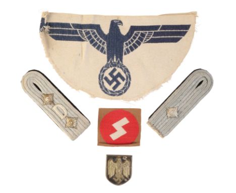 A COLLECTION OF GERMAN INSIGNIA to include DJ Rune with RZM tag to reverse; German Army Sports Eagle vest badge; pith helmet 