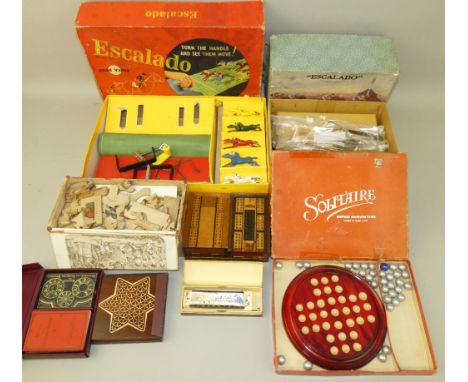 A collection of mostly boxed vintage toys and games, to include Wallis's Geographical Game, La Corona De Manuel Lopez cigar b