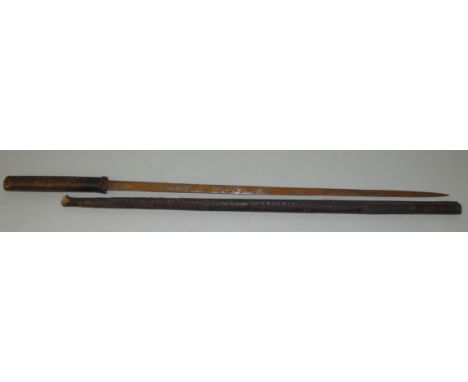 A Victorian sword stick of native manufacture possibly North African, the scabbard and handle covered in worked leather, havi